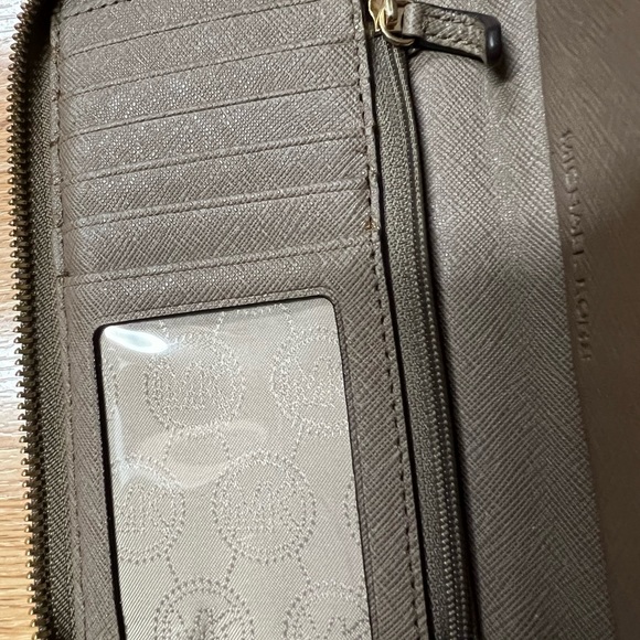 Michael Kors wristlet wallet taupe color good used condition. Gold slightly worn - Picture 4 of 6